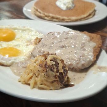 The Rooster’s Den - Country fried steak, sunny side and hash brown casserole! - American Near Me - Newburgh, Indiana