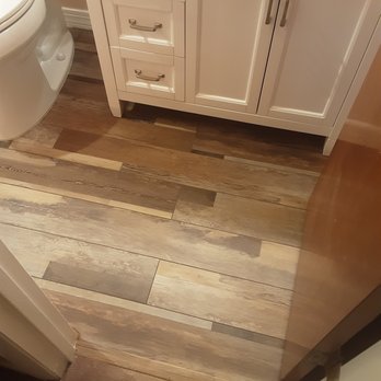 J Vernon Enterprises - a bathroom with wood flooring - General Contractors Near Me - Palm Bay, Florida J Vernon Enterprises - a bathroom with wood flooring - General Contractors Near Me - Palm Bay, Florida
