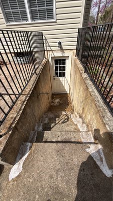 Power Washing Job Bristow VA - This customer was tired of her dirty walk up basement, so she called us to clean it up. It took us about 30 minutes we were able to make it look new again and she was extremely happy