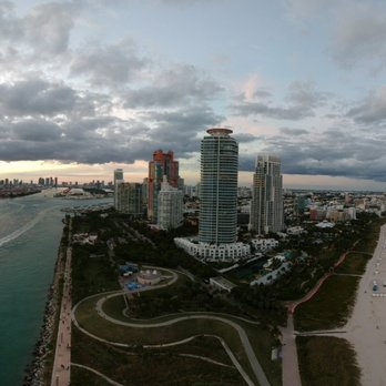 South Pointe Park - Looking south down Government Cut with South Point Park to the right, Fisher Island to the left and downtown Miami beyond. - Parks Near Me - Miami Beach, Florida South Pointe Park - Looking south down Government Cut with South Point Park to the right, Fisher Island to the left and downtown Miami beyond. - Parks Near Me - Miami Beach, Florida