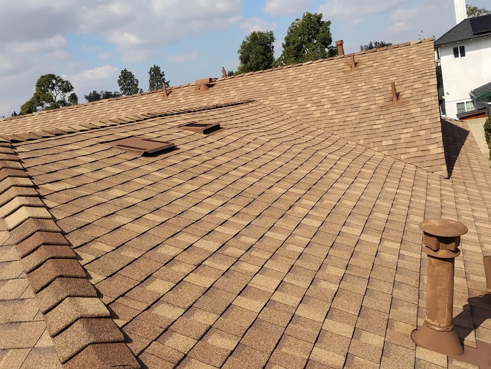 Slide of Sam's Roofing Co