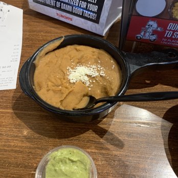 Torchy's Tacos - Beans and the avocado dip it's the best so I think - Tacos Near Me - Fort Worth, Texas Torchy's Tacos - Beans and the avocado dip it's the best so I think - Tacos Near Me - Fort Worth, Texas