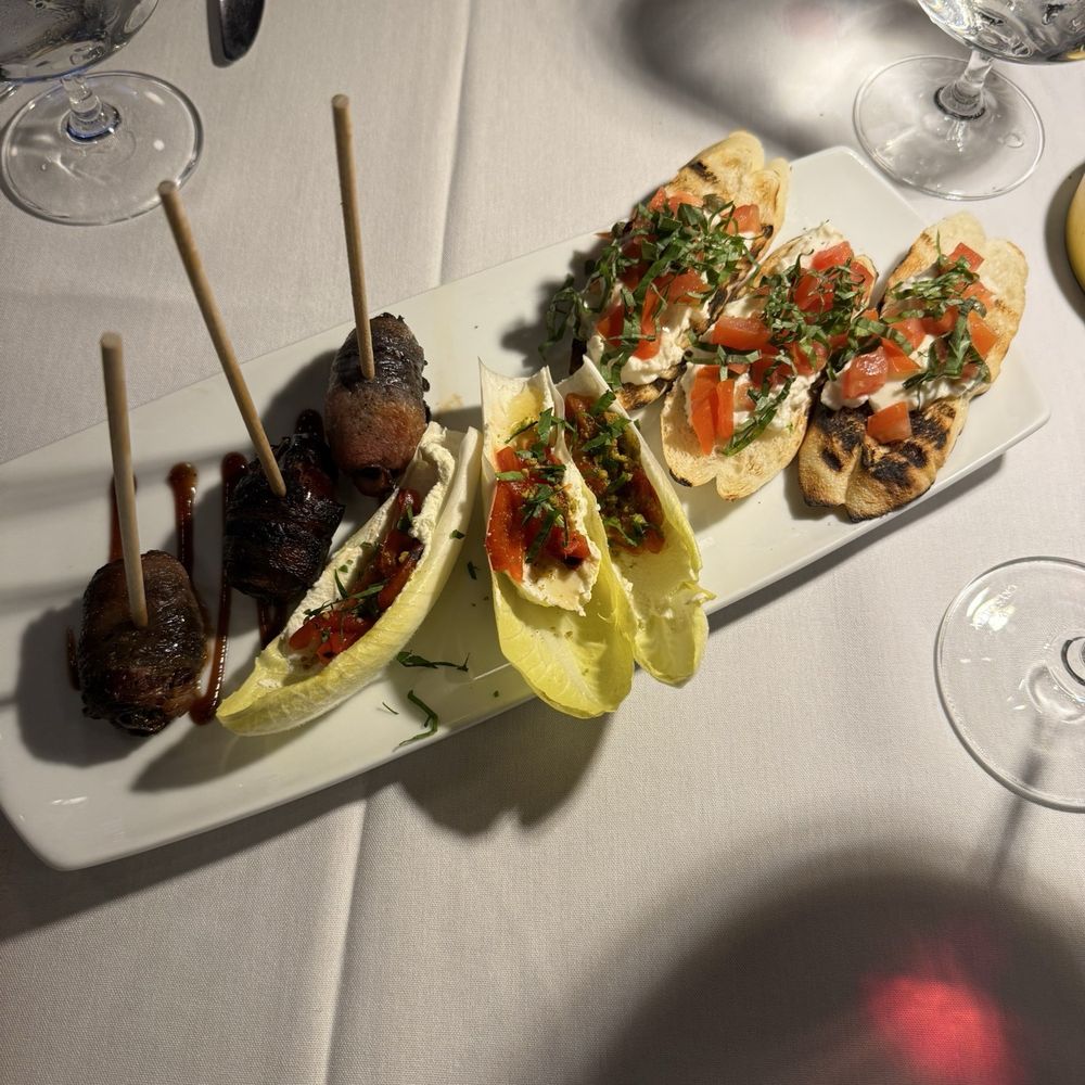 Marco's Kitchen - Appetizers from the RW menu. Chorizo stuffed bacon wrapped dates, burrata filled endive and ricotta bruschetta. - French Near Me - La Grange, Illinois