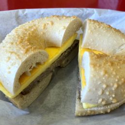 Sausage, egg and cheese on an Asiago cheese bagel Sausage, egg and cheese on an Asiago cheese bagel