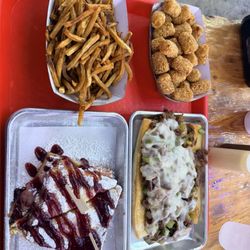 Montecrosto, original philly cheesesteak, fries, & tots