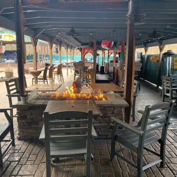 Up a Creek - a patio with a fire pit - Bars Near Me - Howland, Ohio