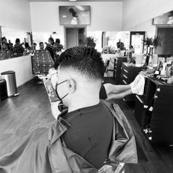Legacy Barbershop - Haircut by AJ. Book your appointment today!