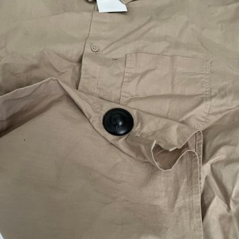 H&M - One of the shirts with the security tag still attached. - Women's Clothing Near Me - Tempe, Arizona
