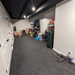 Total Home Improvement - Basement storage area (rubberized flooring, installed ejector pit, installed closet for W/D hookup)
