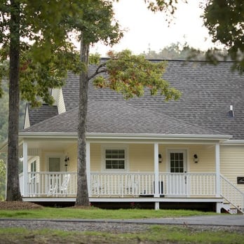 Stonehill Cottages - The wrap around porch of the Farmhouse cottage rental - Vacation Rentals Near Me - Mena, Arkansas Stonehill Cottages - The wrap around porch of the Farmhouse cottage rental - Vacation Rentals Near Me - Mena, Arkansas