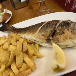 Pescadito - Sea Bass with fries and a side salad.   Can't lose.