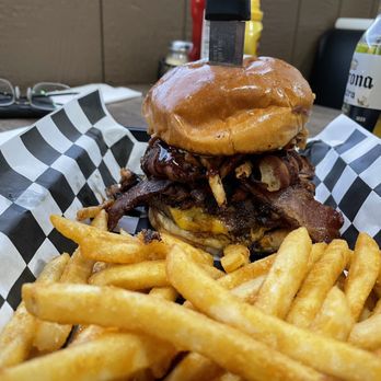 Backroads Bar and Grill - Backroads burger, and there are onions wrapped in bacon on it also! How could you not love it. - Bars Near Me - Chattaroy, Washington Backroads Bar and Grill - Backroads burger, and there are onions wrapped in bacon on it also! How could you not love it. - Bars Near Me - Chattaroy, Washington