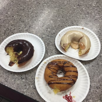 Duck Donuts - I got the chocolate icing, peanut butter icing and the last one is just a fudge drizzle. - Donuts Near Me - Arlington, Virginia Duck Donuts - I got the chocolate icing, peanut butter icing and the last one is just a fudge drizzle. - Donuts Near Me - Arlington, Virginia