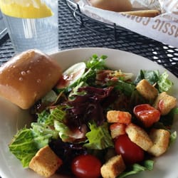 O'Charley's Restaurant & Bar - Salad with raspberry vinaigrette and rolls