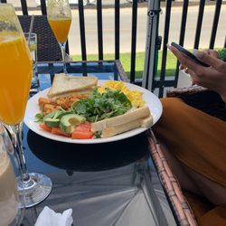 Evviva Breakfast & Lunch - Avocado, tomatoes, scrambled eggs, toast and mimosas