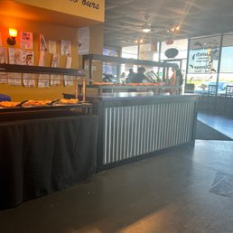 a view of a restaurant counter