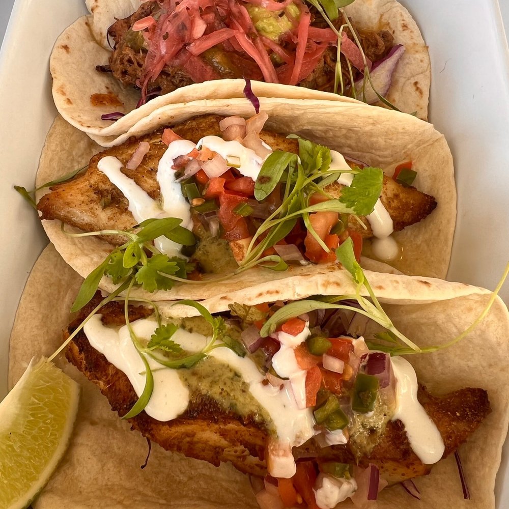 Fish tacos and pulled pork tacos. The pulled pork was incredible!
