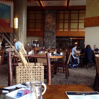 Solstice - people sitting at tables in a restaurant - New American Near Me - Stowe, Vermont