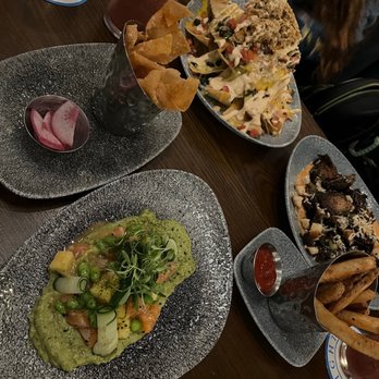 Lamplight Lounge - Salmon Poke* with wonton chips, Brussels Caesar, Lobster Nachos, and a side of fries. 2319 is the mocktail of choice. - New American Near Me - Anaheim, California Lamplight Lounge - Salmon Poke* with wonton chips, Brussels Caesar, Lobster Nachos, and a side of fries. 2319 is the mocktail of choice. - New American Near Me - Anaheim, California