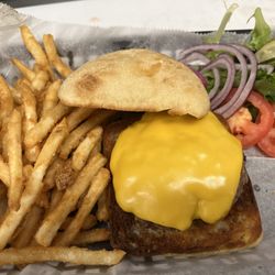 Dovetail Bar and Grill - The Basic Cheeseburger. Start with 1/3 pound of Marchant's beef on a toasted roll. Add your choice of cheese, french fries or homemade slaw