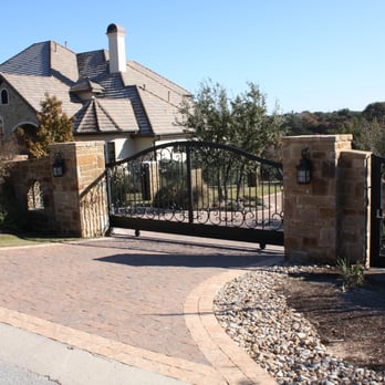 Northwest Fence & Iron - Custom arch iron slide gate and masonry - Fences & Gates Near Me - Austin, Texas Northwest Fence & Iron - Custom arch iron slide gate and masonry - Fences & Gates Near Me - Austin, Texas