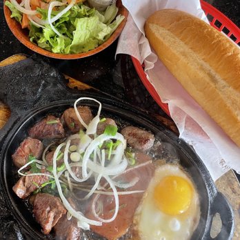 Yummy Pho & Bo Ne - #14. Bo Ne/Steak And Egg Sizzling Plate - Vietnamese Near Me - Katy, Texas Yummy Pho & Bo Ne - #14. Bo Ne/Steak And Egg Sizzling Plate - Vietnamese Near Me - Katy, Texas