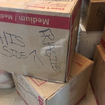 Gravitas Moving - Dented fragile box - Movers Near Me - Albuquerque, NM, New Mexico