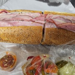 Slack's Hoagie Shack - Italian on a seeded roll side of pepper relish, sweet peppers,  and pickles