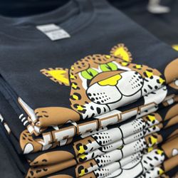 Ink Head Prints - Jefferson's mascot, Jeffrey, showing pride on their new merch!