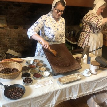 Clough House at Old North - Melting down the chocolate numbs and spices to creat the chocolate mix for the traditional chocolate drink. - Historical Tours Near Me - Boston, Massachusetts Clough House at Old North - Melting down the chocolate numbs and spices to creat the chocolate mix for the traditional chocolate drink. - Historical Tours Near Me - Boston, Massachusetts