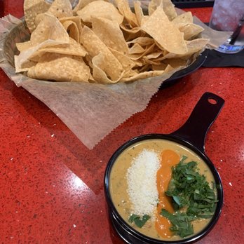 Torchy's Tacos - Chips and half order of queso - Tacos Near Me - Altamonte Springs, Florida Torchy's Tacos - Chips and half order of queso - Tacos Near Me - Altamonte Springs, Florida