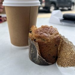 CocoLuxe Fine Pastries - Chocolate chip muffin, hot coffee