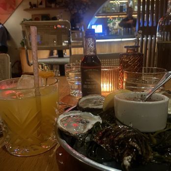 Little Ways - Oysters and said yummy cocktail. - American Near Me - New York, New York