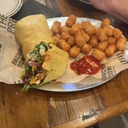 Buffalo chicken wrap with tater tots
