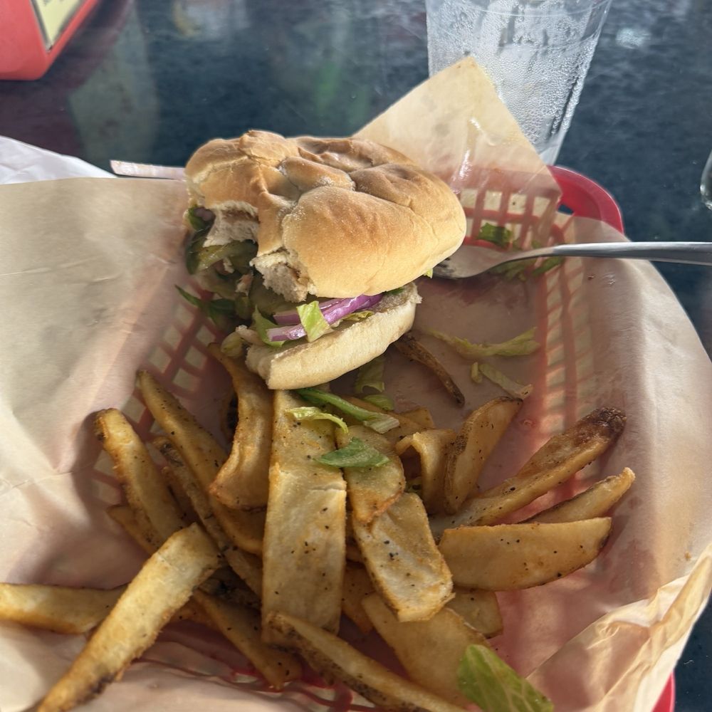 Tiki & Raw Bar - Blackened chicken sandwich - Tiki Bars Near Me - Orange Beach, Alabama Tiki & Raw Bar - Blackened chicken sandwich - Tiki Bars Near Me - Orange Beach, Alabama