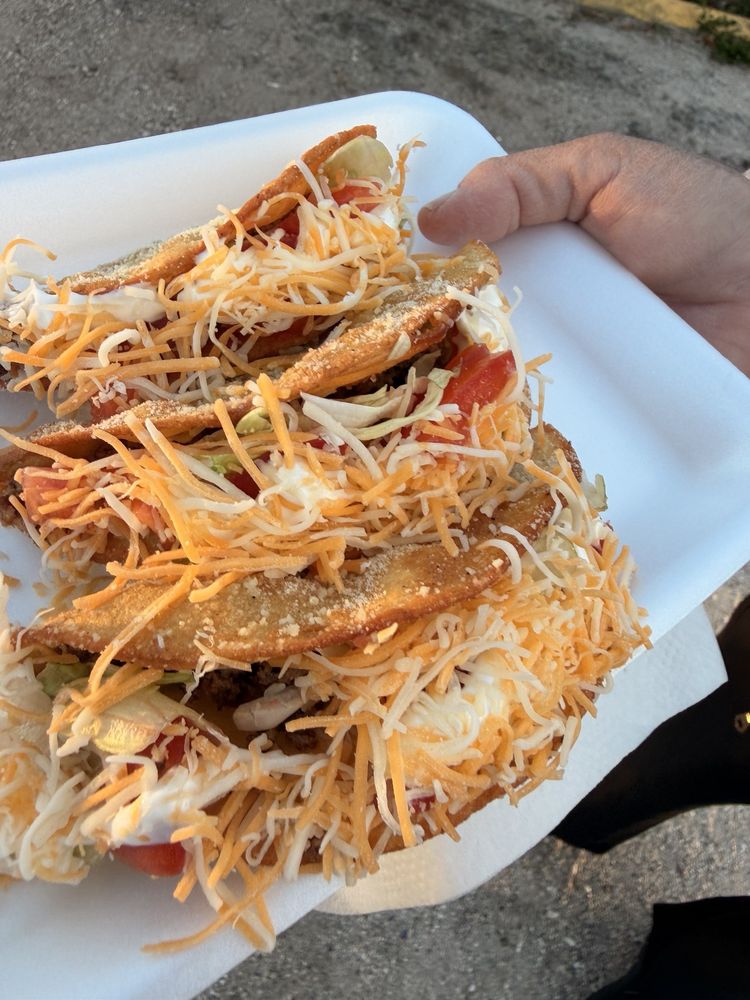 Abuelito Ricos Crispy Tacos Logo