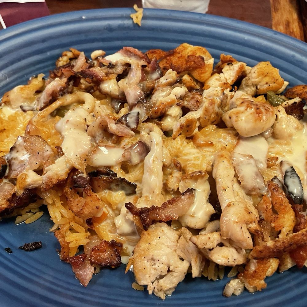 Chicken Alhambra served with corn tortillas. Chicken Alhambra served with corn tortillas.
