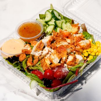 BAD CHX - Katy - a salad in a plastic container - Chicken Wings Near Me - Katy, Texas