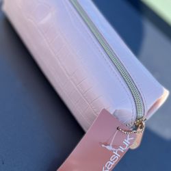 Target - Sonia Kashuk Pencil Makeup Case is not only cute, but held all my makeup I got for our baby moon!