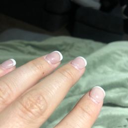 8 days after manicure. Peeling up, things getting caught under nails.