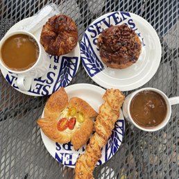 Top right: Kouign-Amann Top left: pecan sticky bun Bottom right: goat cheese danish Bottom left: cheesy twist stick Top right: Kouign-Amann Top left: pecan sticky bun Bottom right: goat cheese danish Bottom left: cheesy twist stick