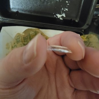 Wingstop - a person's hand holding a piece of food - Chicken Wings Near Me - Streamwood, Illinois Wingstop - a person's hand holding a piece of food - Chicken Wings Near Me - Streamwood, Illinois