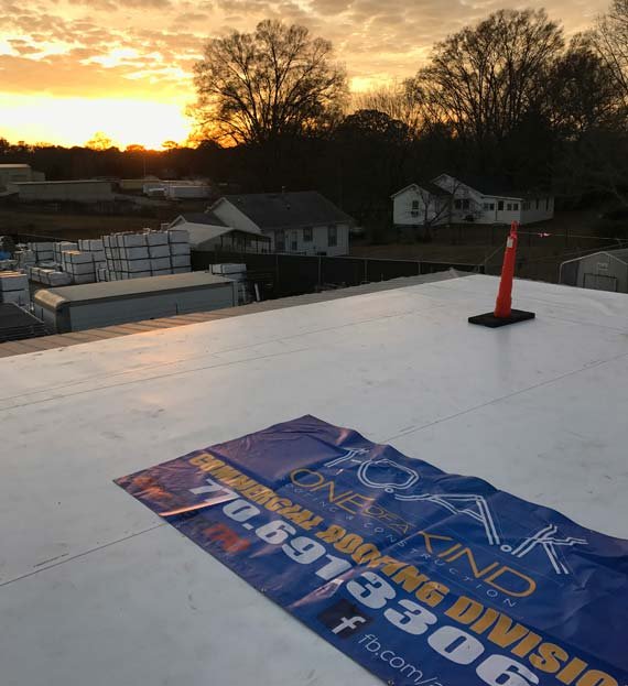 Slide of One of A Kind Kennesaw Roofers