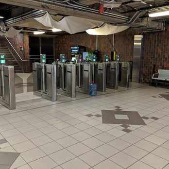 Glencairn Subway Station - Collector booth & Presto fare gates on the Glencairn Ave side (the north side) of the station & train platform. September 2018 - Public Transportation Near Me - Toronto, Ontario Glencairn Subway Station - Collector booth & Presto fare gates on the Glencairn Ave side (the north side) of the station & train platform. September 2018 - Public Transportation Near Me - Toronto, Ontario