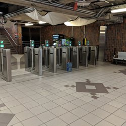 Glencairn Subway Station - Collector booth & Presto fare gates on the Glencairn Ave side (the north side) of the station & train platform. September 2018