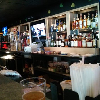 Paddy's Ale House - a bar with a television in the background - Irish Pub Near Me - Dracut, Massachusetts Paddy's Ale House - a bar with a television in the background - Irish Pub Near Me - Dracut, Massachusetts