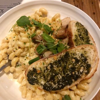 Three V - Three V's Signature Mac - pork belly, Italian sausage, three cheese sauce, butter crumbs, pesto crostini - New American Near Me - Plymouth, Massachusetts Three V - Three V's Signature Mac - pork belly, Italian sausage, three cheese sauce, butter crumbs, pesto crostini - New American Near Me - Plymouth, Massachusetts