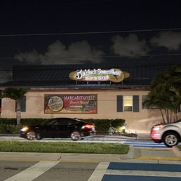 Exterior outside entrance of 5 o'Clock Somewhere Bar & Grill - Hollywood, Florida Exterior outside entrance of 5 o'Clock Somewhere Bar & Grill - Hollywood, Florida