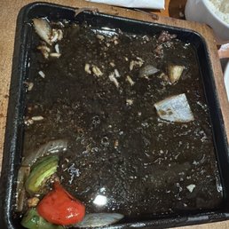 Sizzling shredded beef meets my appetite. Sizzling shredded beef meets my appetite.