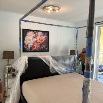 ELR Group - An example of how he individually wrapped and taped each post instead of just throwing a plastic tarp over the bed. - Electricians Near Me - Fort Lauderdale, Florida